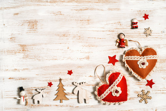 shabby chic Christmas background with rustic decorations and felt hearts