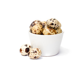 Fresh  quail egg in a bowl isolated