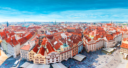 Old Town Square in Prague from Clock Tower. Many colored houses at the bottom of the square. Aerial...