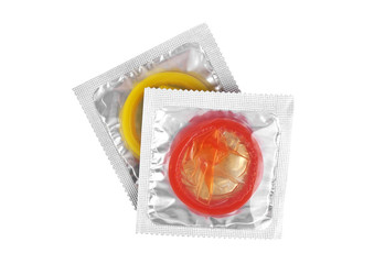 Close up of a colored condoms on white background