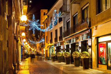 Fototapeta na wymiar Christmas decorations in Old Town of Alba.