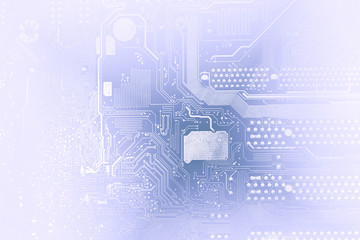 Circuit board toned into dark blue, with diverging diamonds. Mot