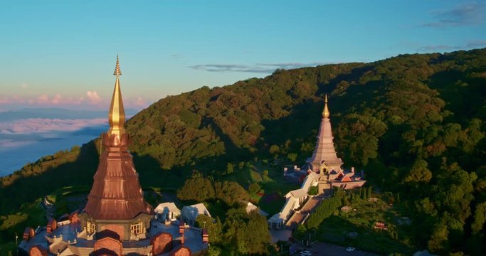 Aerial view of Buddhist pagoda temple in Thailand at sunrise