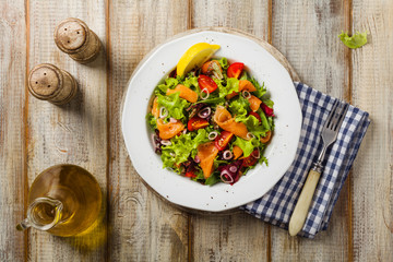 Fresh salad with smoked salmon.