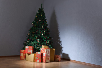 Christmas tree with gifts in colourful boxes
