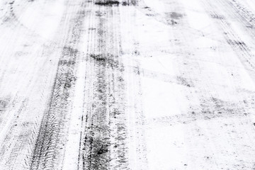 Winter road texture, tire tracks in snow
