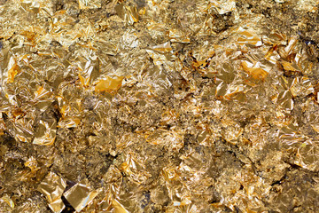 gold leaf on black background for you texture 