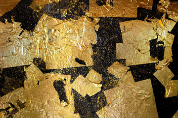 gold leaf on black background for you texture 