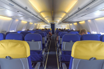 Interior passenger cabin with seats on the airplane