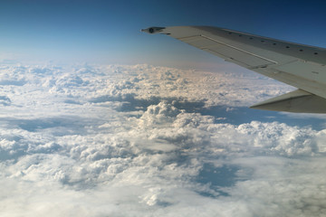 view from window of a jet plane wing with beautiful weather