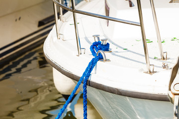 Tied blue sailing rope on white boat © anetlanda
