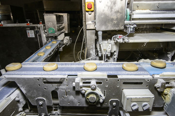 Bread dough running on conveyor belt