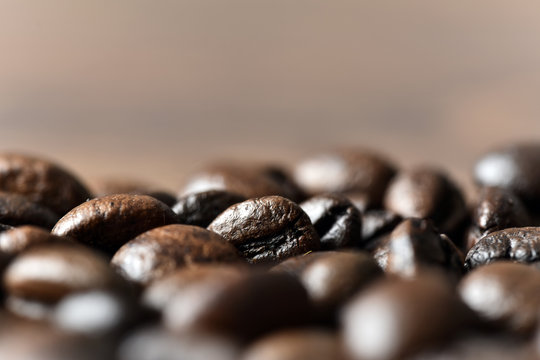 Roasted coffee beans on board close-up
