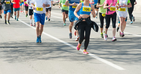 Marathon, street runners  in spring day