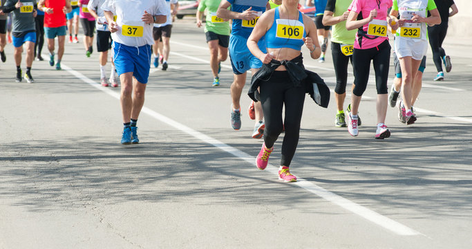 Marathon, street runners  in spring day