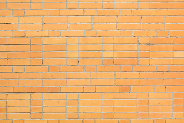 Texture of yellow brick wall