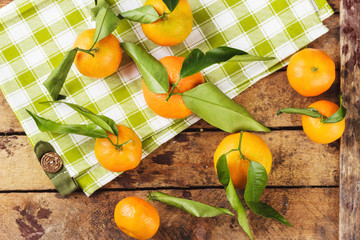 Orange mandarins on the wooden boards