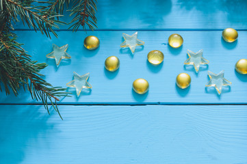 christmas tree and magic golden marble. turquoise blue background