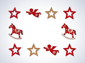 Christmas frame on a white background (Christmas wooden decoration over white background )