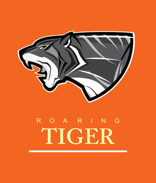 Tiger. Tiger head. Roaring tiger. Side view of tiger head.