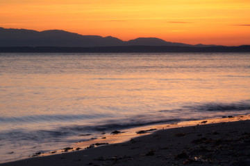 Fototapeta na wymiar Sunset at the Golden Gardens Beach, Seattle, Washington (US)