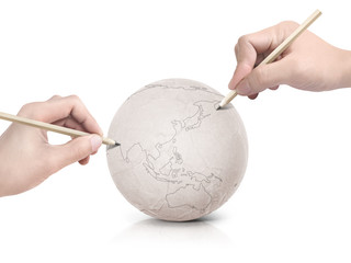 Two hand stroke drawing Asia map on paper ball on white background