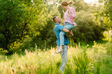 Fototapeta premium happy couple on a walk in the summer park
