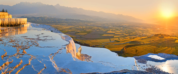 Panorama terraces from travertine in Pamukkale at sunset. - 128864326