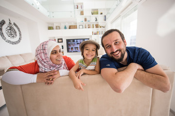 Mother father and son as a happy family at home