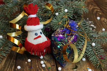 Snowman near the Christmas tree and candy