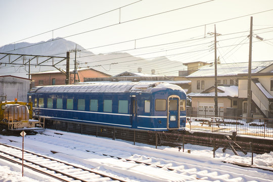 Train on railway,Snowy on railway,Japan transportation,Morning d