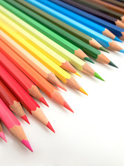 palette of multicolored slim crayons side view