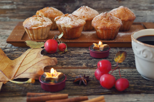 Apple muffins, cup of coffee and paradise apples