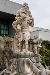 Fototapeta na wymiar Antique statue in garden of Mirabell Palace. Salzburg, Austria.