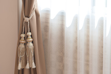 beautiful curtain tie by curtain strap with sunlight