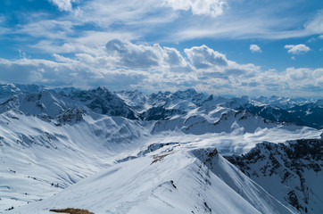 Fototapeta na wymiar Ski touring track in beautiful sunny winter landscape, Kleinwalsertal, Austria
