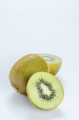 whole kiwi fruit and half