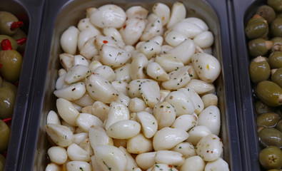Pickled marinated garlic chives in retail tray