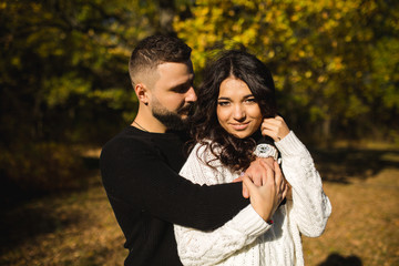 Fototapeta premium Couple in love - Beginning of a Love Story. A man and a girl on the nature while walking