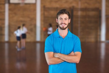 Portrait of sports teacher in basketball court © WavebreakMediaMicro