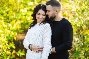 Obraz premium Couple in love - Beginning of a Love Story. A man and a girl on the nature while walking