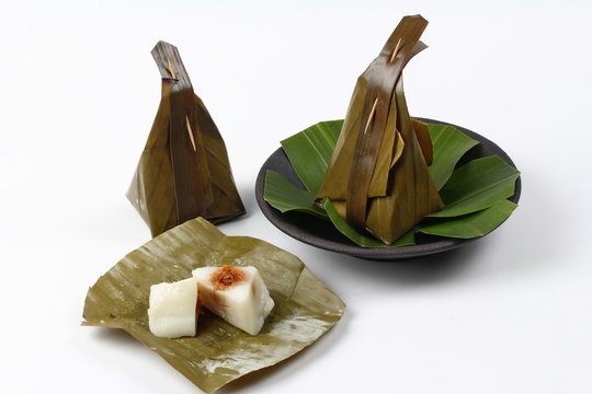 Steamed flour wrap sweet mashed coconut as Khanom Sai Sii