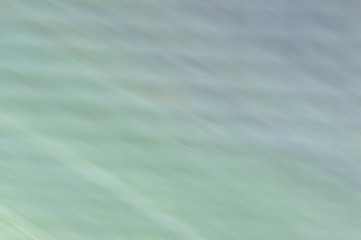 Blurred abstract background. Green purple and white.