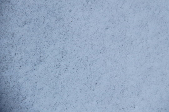 Texture of the white snow. Winter background 