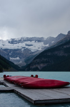 red canoes stacked on dock at Lake Louise