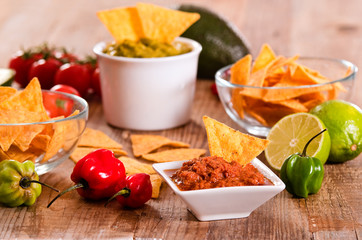 Guacamole and nacho chips.