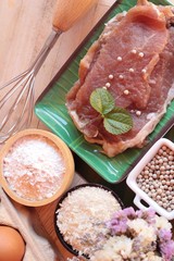 Making pork fried with breaded ( pork cutlet tonkatsu).