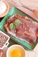 Making pork fried with breaded ( pork cutlet tonkatsu).
