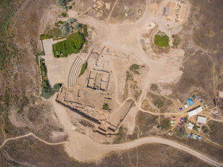 Aerial view of the archaeological excavations and archaeologist