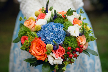 Beautiful summer wedding bouquet. Delicate bright flowers 